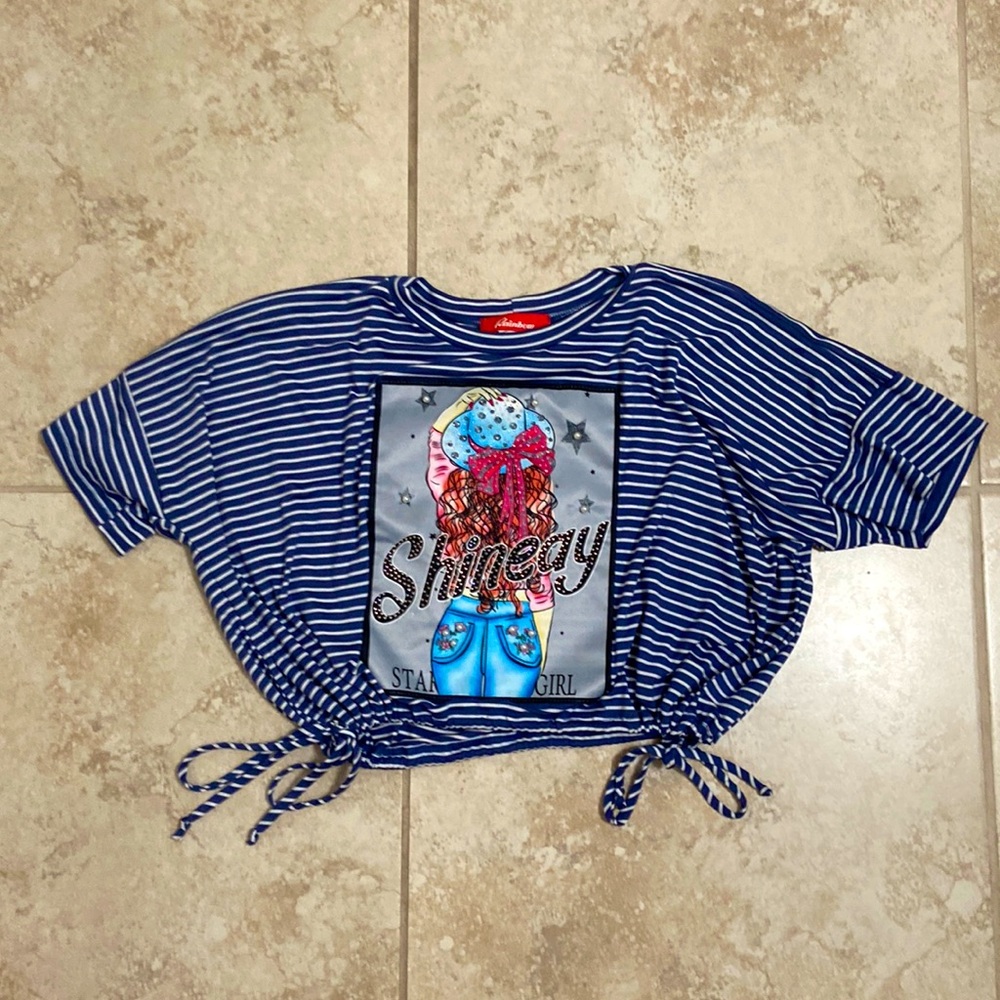 Dark blue and white stripped too with strings on the ends to tie to your liking.